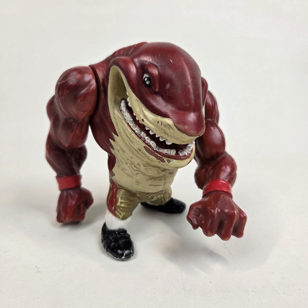 Mattel Street Sharks Big Slammu 1994 vintage action figure gold pants red bands